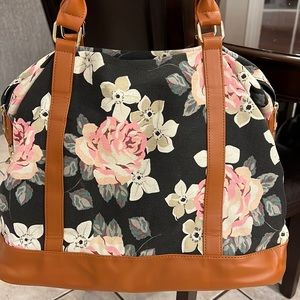 Black weekender/travel bag with floral design